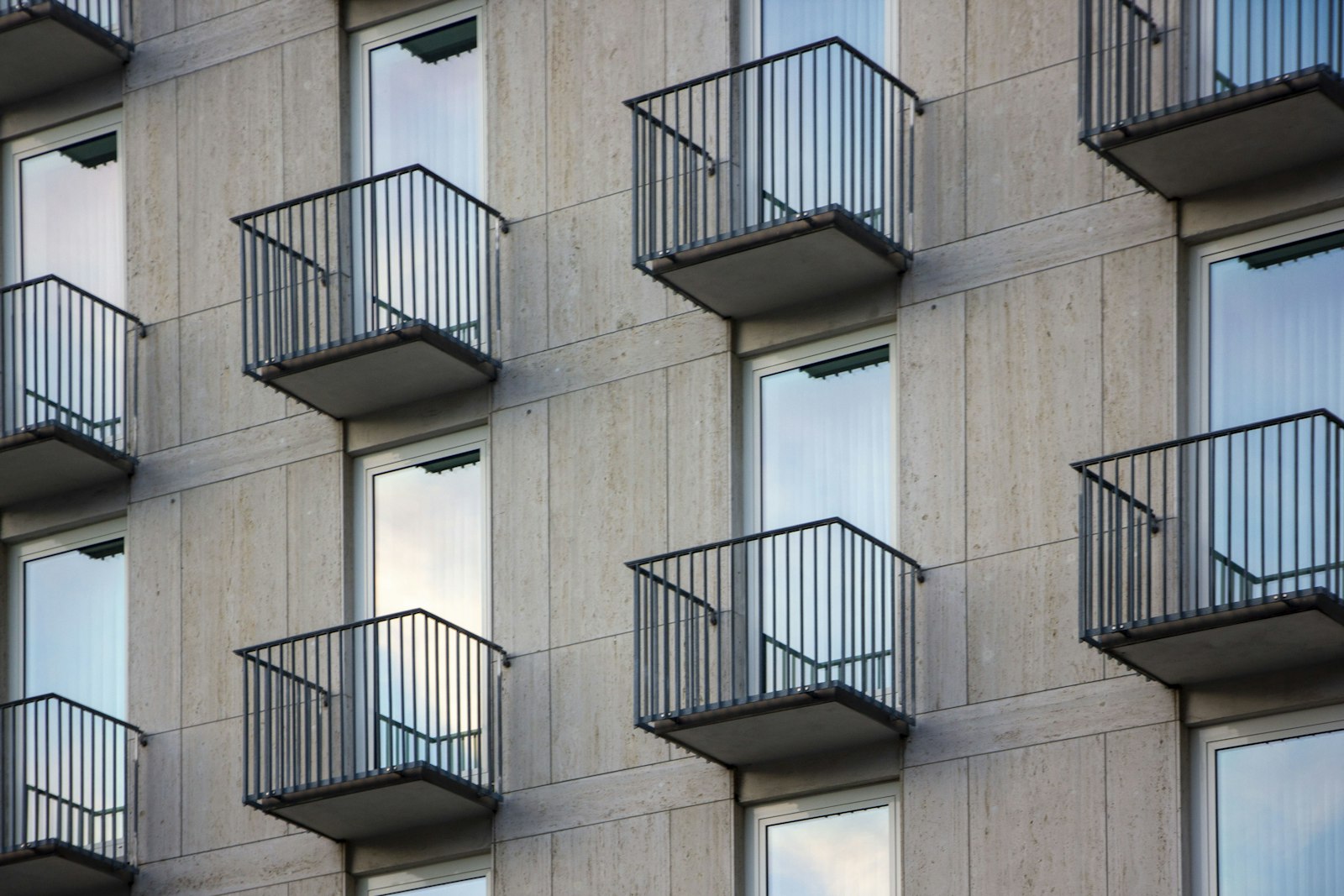 Several balconies on the side of a building